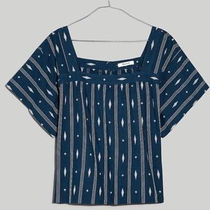 Square-neck top has flowy short sleeves. Easy on the body. Never been worn!